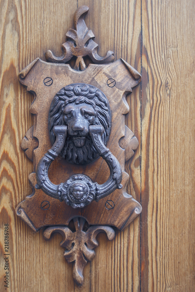 beautiful door handle on wooden door close-up beautiful door handle on wooden door close-up