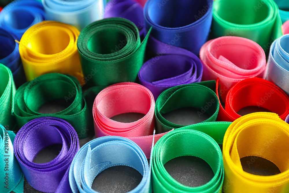 Different satin ribbons on table, closeup Different satin ribbons on table, closeup