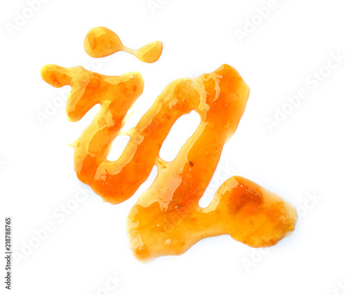 Sweet apricot jam on white background