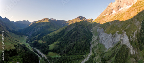 Views showing High mountains, rivers, forests, valleys and the alpine landscape of La Fouly in the Canton of Valais, Switzerland.