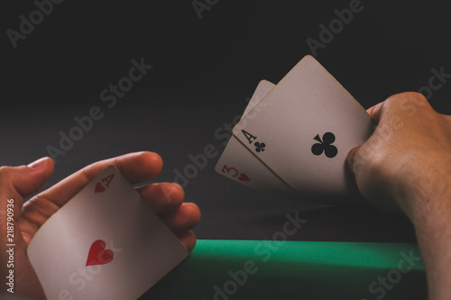 card game sharper a game of poker. two aces. scam photo