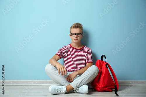 Teenage boy with backpack s...