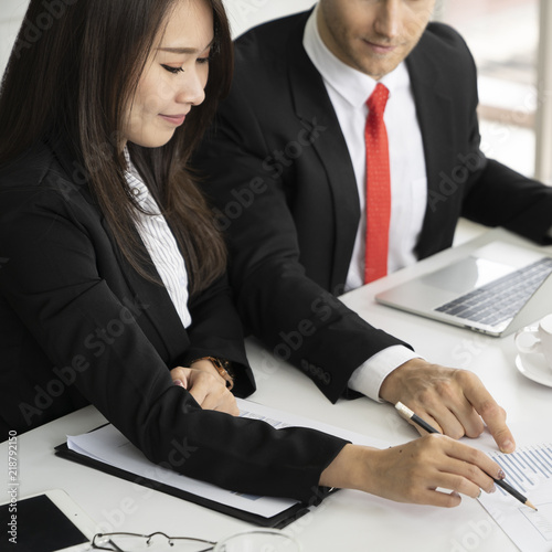 Young business man presented or discuss to client about business project in coference or meeting room. photo