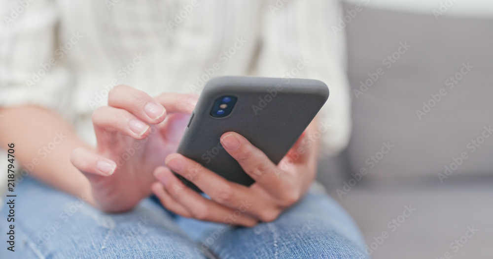 Woman use of mobile phone at home Woman use of mobile phone at home