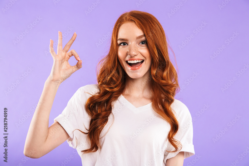 Portrait of a smiling young girl standing