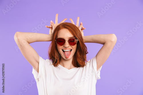 Φωτογραφία Portrait of a pretty young girl in sunglasses