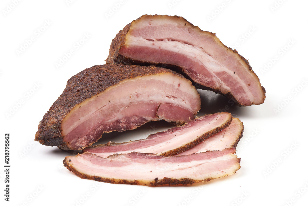 Smoked rustic farmer meat with slices, isolated on white background. Smoked rustic farmer meat with slices, isolated on white background.