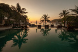 Sunset on Raya Island, Thailand with the pool in the foreground and the beatiful seaview in the backgorund.