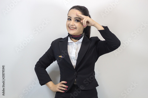 Beautiful stewardess. Studio shot with fly attendant woman.