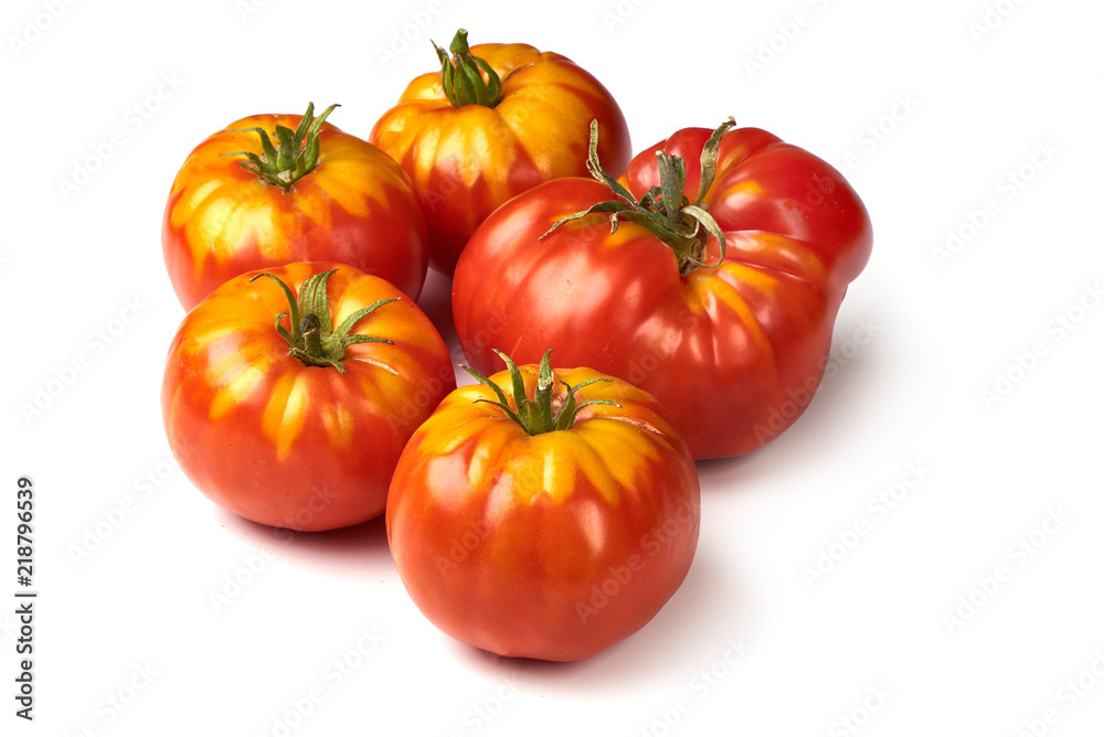 Fresh colorful sweet rustic tomatoes, isolated on white background. Fresh colorful sweet rustic tomatoes, isolated on white background.