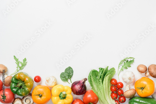 top view of ripe vegetables and herbs isolated on white