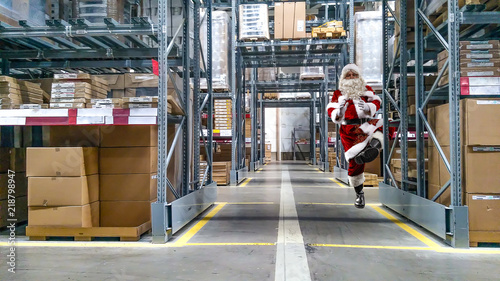 Wallpaper Mural Santa claus and gifts with free space for your decoration.  Torontodigital.ca