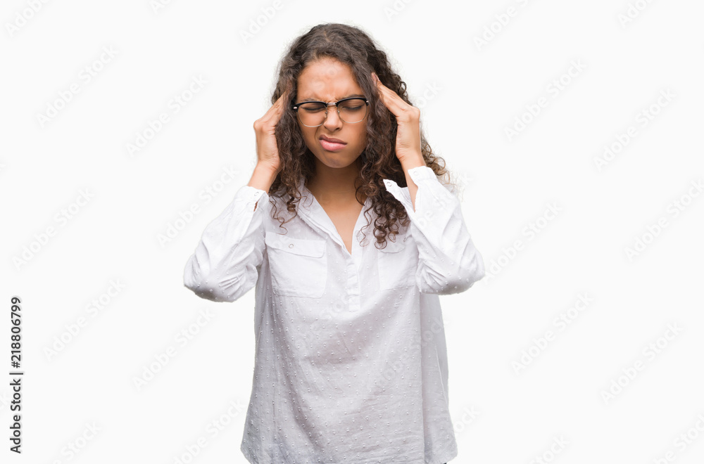 Beautiful young hispanic woman with hand on head for pain in head because stress. Suffering migraine. Beautiful young hispanic woman with hand on head for pain in head because stress. Suffering migraine.