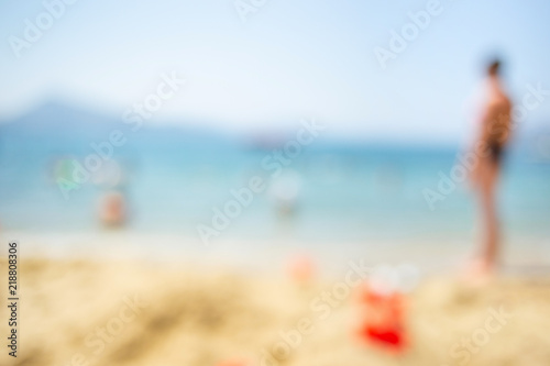 Summer background with blurred beach. Vacation and holiday concept.