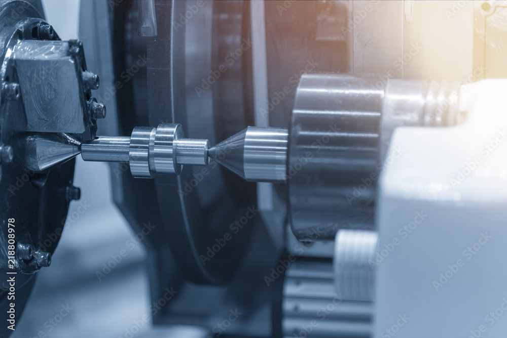 The CNC cylindrical grinding machine making the automotive cam shaft