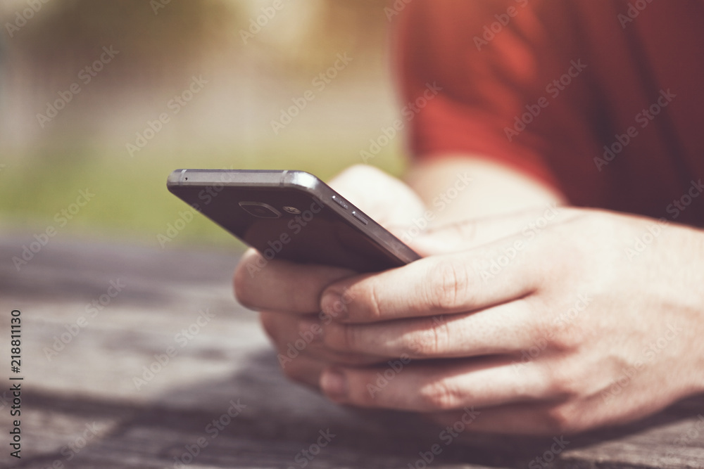 Hands using smart phone touching screen with fingers Hands using smart phone touching screen with fingers