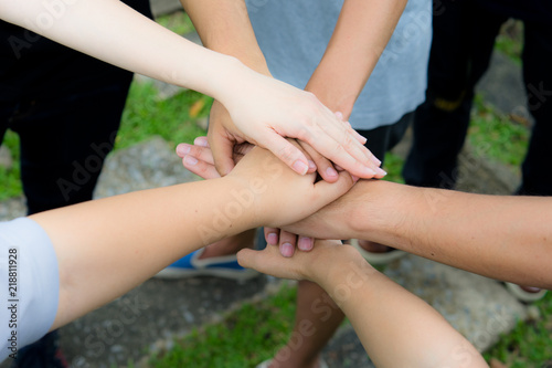 Obraz na płótnie Hands join together as commitment to work as strong team