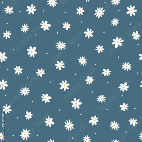 Fototapeta Naklejka Na Ścianę i Meble -  Scattered small daisies and round dots. Cute floral seamless pattern. Repeated feminine print.