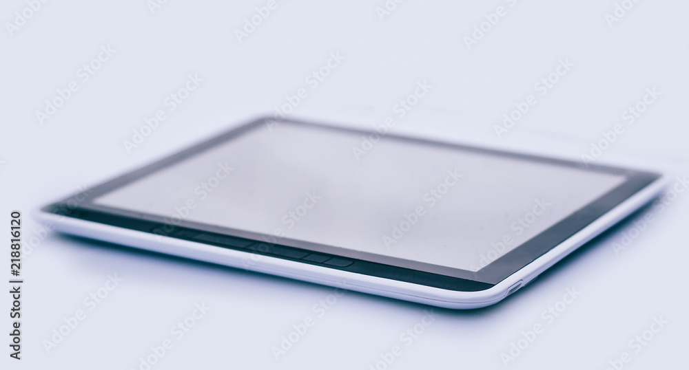closeup . black tablet pc . isolated on a black background. closeup . black tablet pc . isolated on a black background.