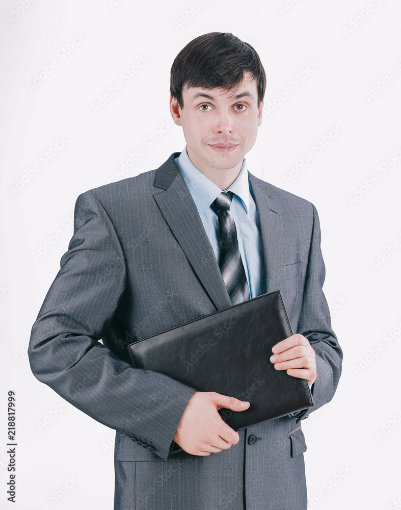 young employee standing with working papers young employee standing with working papers