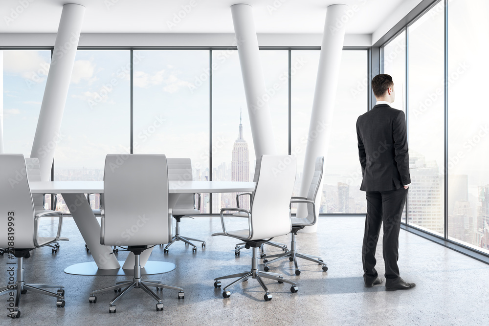 Thoughtful businessman in conference room Thoughtful businessman in conference room