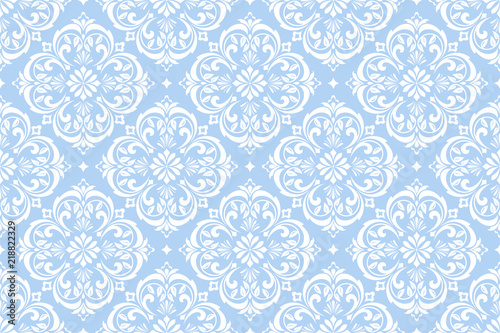 Wallpaper in the style of Baroque. Seamless vector background. White and blue floral ornament. Graphic pattern for fabric, wallpaper, packaging. Ornate Damask flower ornament