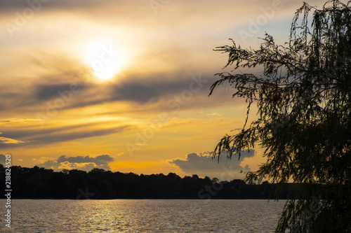Fototapeta Naklejka Na Ścianę i Meble -  Elk, Poland - Panoramic sunset view over the Elckie lake in the town of Elk