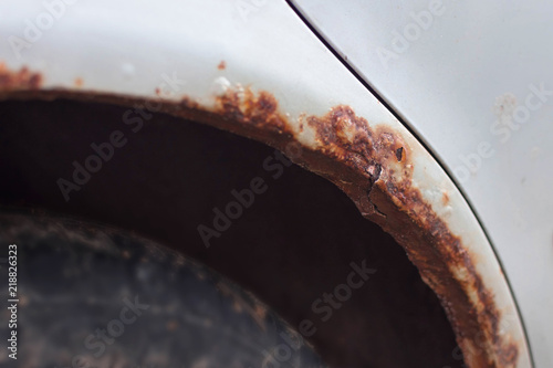 Rusty car arch. Destroyed car. Rust.