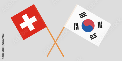 Crossed flags South Korea and Switzerland. Official colors. Correct proportion. Vector