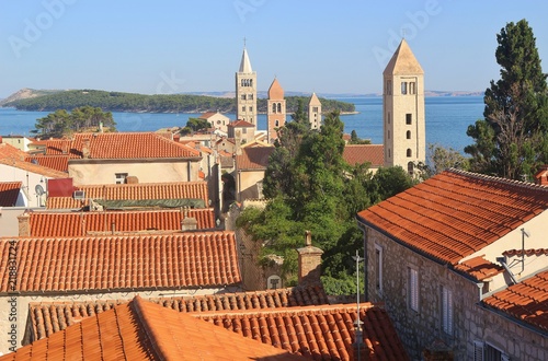Panoramic view of the old town of Rab with the famous four clock towers. On Rab island, Croatia, South-East Europe.