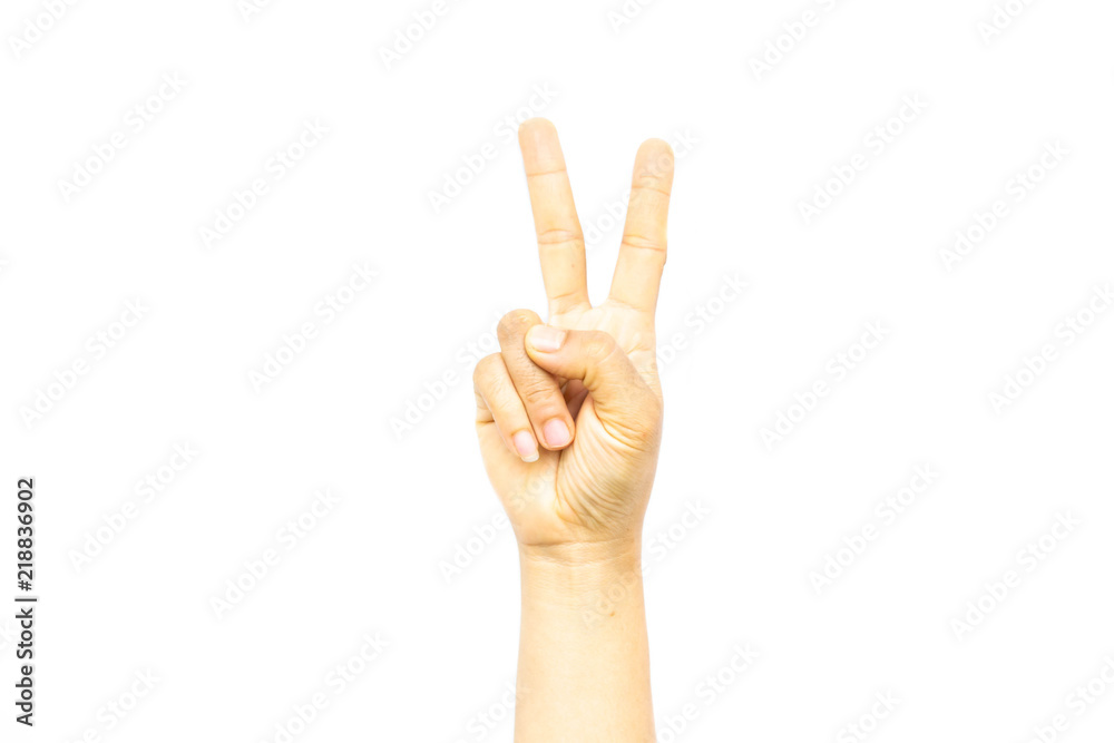Woman's hand with two fingers up isolated on white background Woman's hand with two fingers up isolated on white background