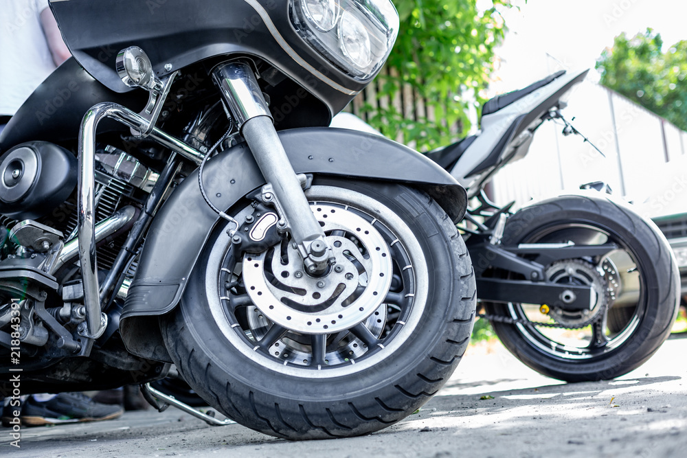 Obraz premium Vintage motorcycle parking on the road. Side view, close up