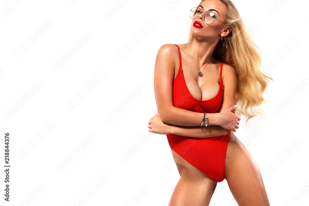 Close-up portrait of beautiful sexy blonde woman with big boobs on white  background in red swimsuit. Summer lifestyle concept. Stock Photo | Adobe  Stock