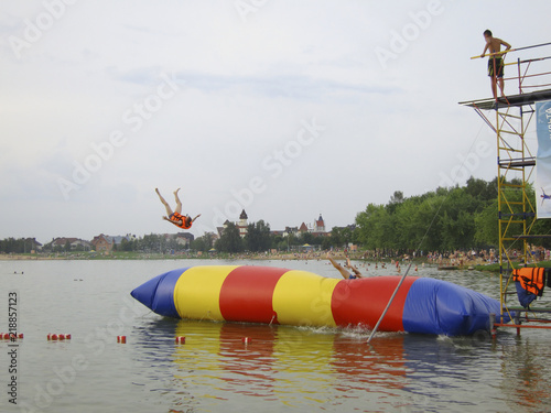 High jump over the water photo