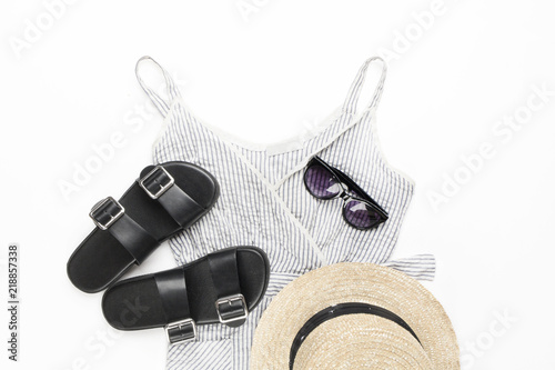 Collection collage of women s clothing. Sundress-dress  straw hat  sunglasses  sandals. Top view  flat lay.