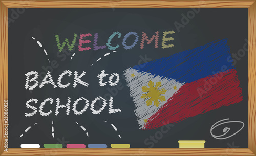 Back to school with learning and childhood concept. Banner with an inscription with the chalk welcome back to school and the Philippines national flag