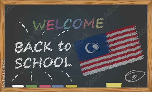 Back to school with learning and childhood concept. Banner with an inscription with the chalk welcome back to school and the Malaysia national flag