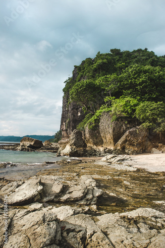 The rocky beach shore of Playa Cuevas in between Santa Teresa and Malpaís on the Nicoya peninsula of Costa Rica © Lozzy