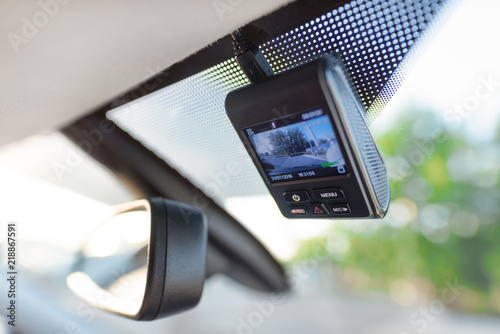 фотографія Video recorder next to a rear view mirror