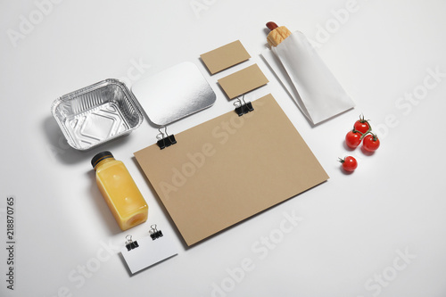 Composition with items for mock up design on light background. Food delivery service