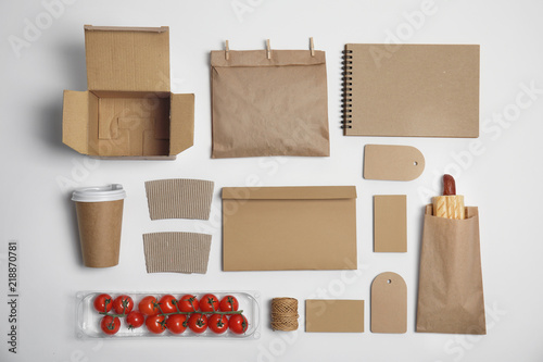 Flat lay composition with items for mock up design on light background. Food delivery service photo