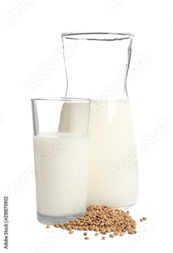 Glassware with hemp milk on white background