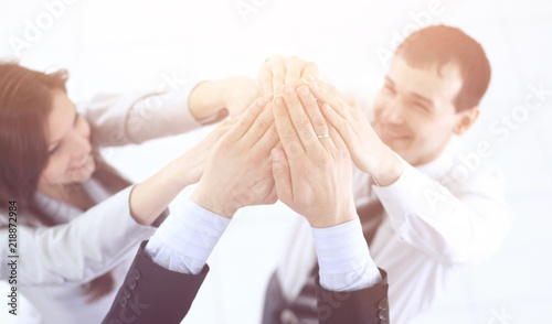 friendly business team holding hands photo