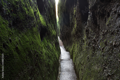 Sky Lane Cave scenery in Lang Mountain, Langshan - China National Geopark, Xinning County Hunan province. Unique Danxia Landform, UNESCO Natural World Heritage site. Narrow walkway, claustrophobic photo