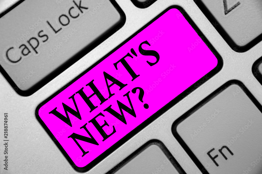 Writing note showing What s is New question. Business photo showcasing Asking about latest Updates Trends Happening News Keyboard purple key Intention computer computing reflection document. Writing note showing What s is New question. Business photo showcasing Asking about latest Updates Trends Happening News Keyboard purple key Intention computer computing reflection document.