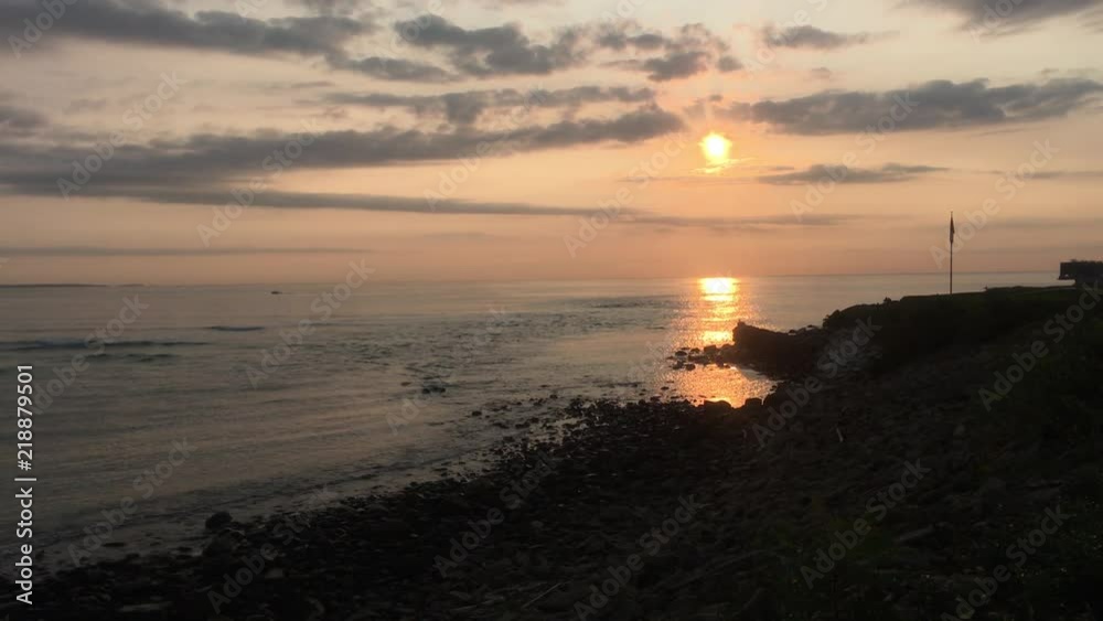 peaceful sunrise with passing boat in Ogunquit, Maine peaceful sunrise with passing boat in Ogunquit, Maine
