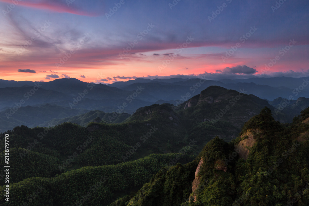 Sky Lane Sunrise Danxia scenery in Lang Mountain, Langshan - China National Geopark, Xinning County Hunan province. Unique Danxia Landform, UNESCO Natural World Heritage site. Purple and Pink Sky