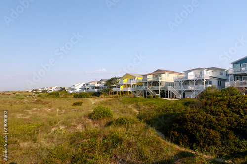 Vacation beach rentals on the green sand dunes, Sunset Beach, North Carolina © Richard McGuirk