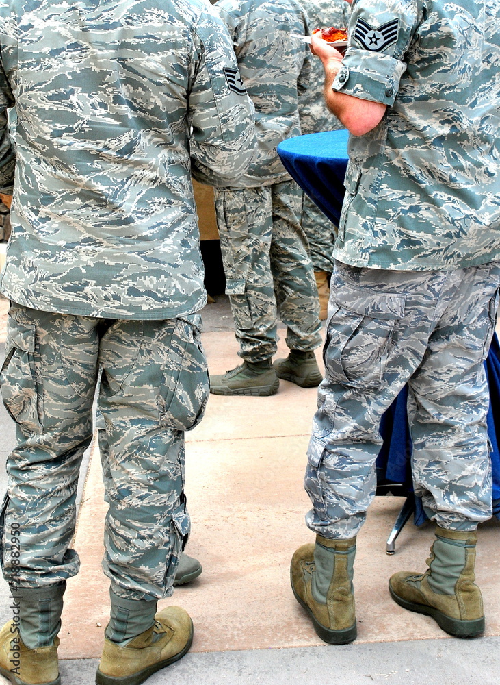 United states military men and women having a lunch brunch outdoors. United states military men and women having a lunch brunch outdoors.