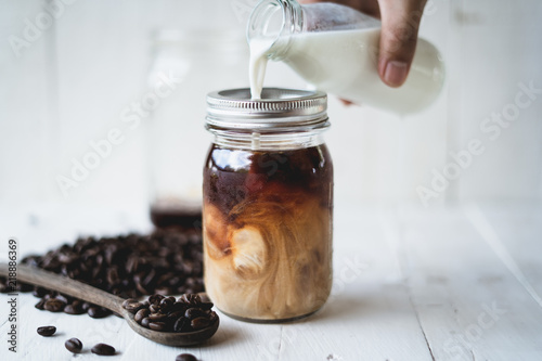 Obraz na płótnie Cold brew coffee Arabica coffee In a glass bottle